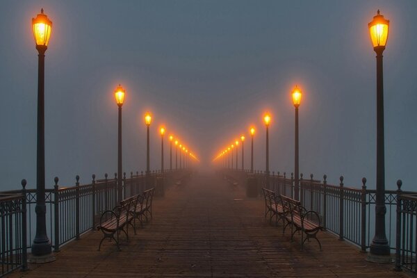 Foggy pavement and lanterns