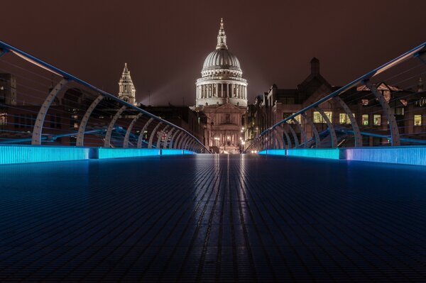 The glow of the bridge over the river in London