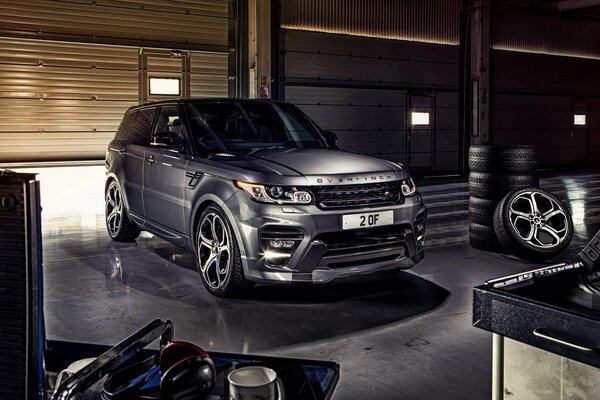 Range Rover sport in a body kit in the garage