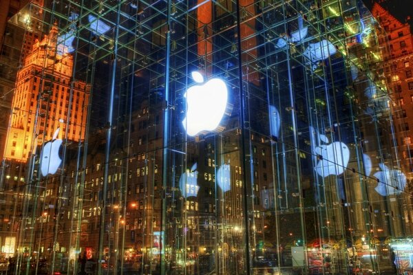 Luminous, mirrored showcase with apple logo