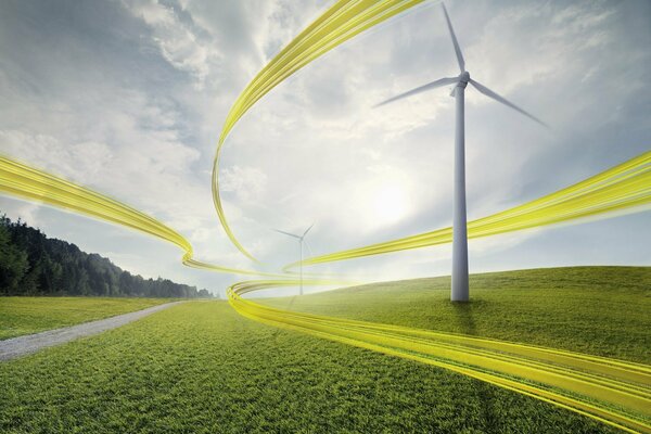 Windmills in a green clearing with clouds