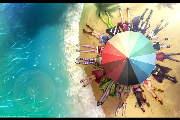 Vacationers on the golden beach under an umbrella