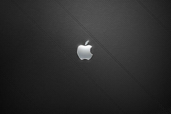 Logotipo de Apple sobre fondo texturizado