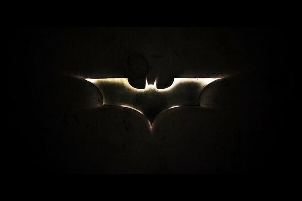 On a black background, the Batman symbol