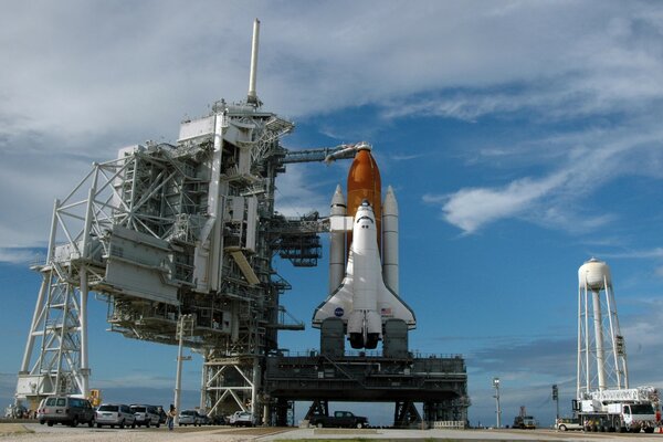 Shuttle on the background of the sky with clouds