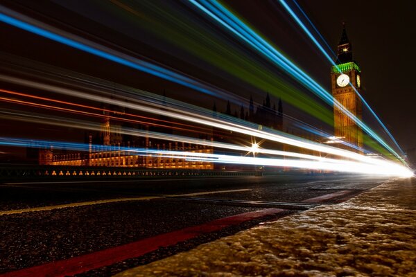 Big Ben in London. night. headlights