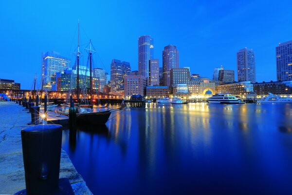 View from the river side of the night skyscrapers