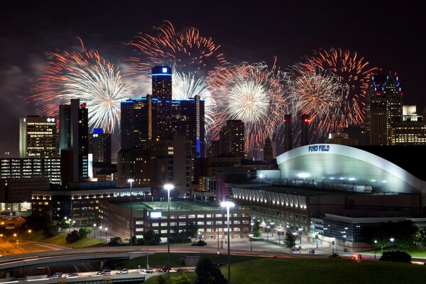 Fireworks over the skyscrapers of the night city of Lepoi