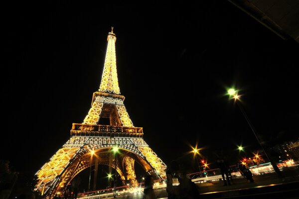 Bottom view of the Eiffel Tower at night