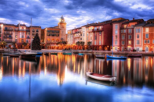 City coast with boats at dusk