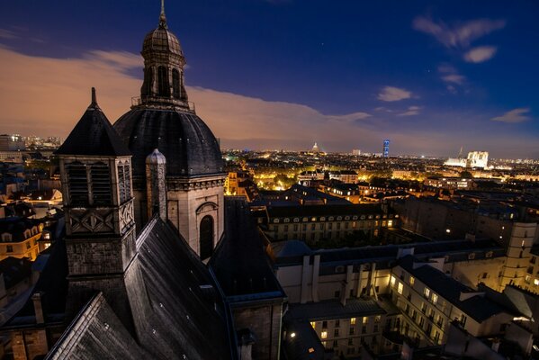 At night on the roof of a house in France