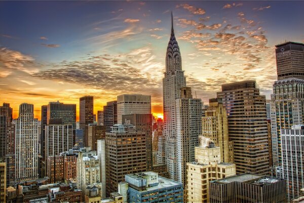 Tall buildings of New York at sunset