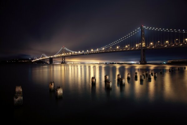 Glowing bridge across the river in San Francisco