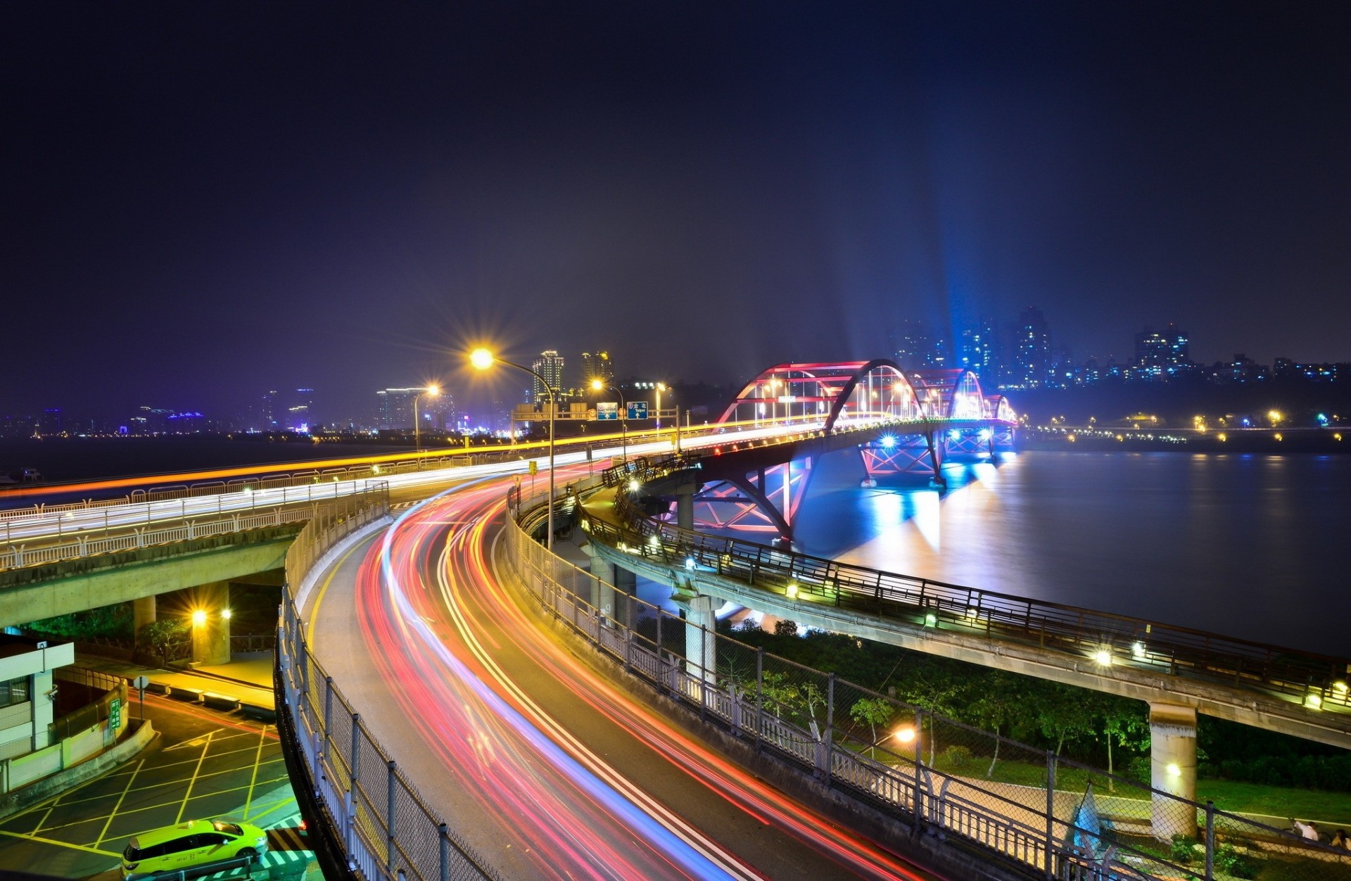 luces puente noche río ciudad