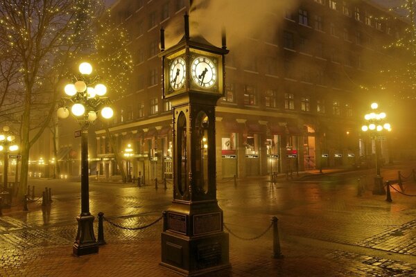 Londan night street with clock