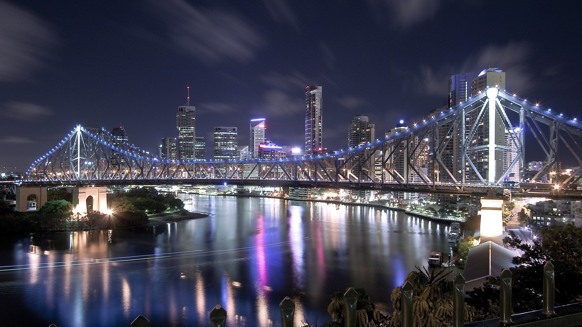 lumières pont nuit rivière maisons