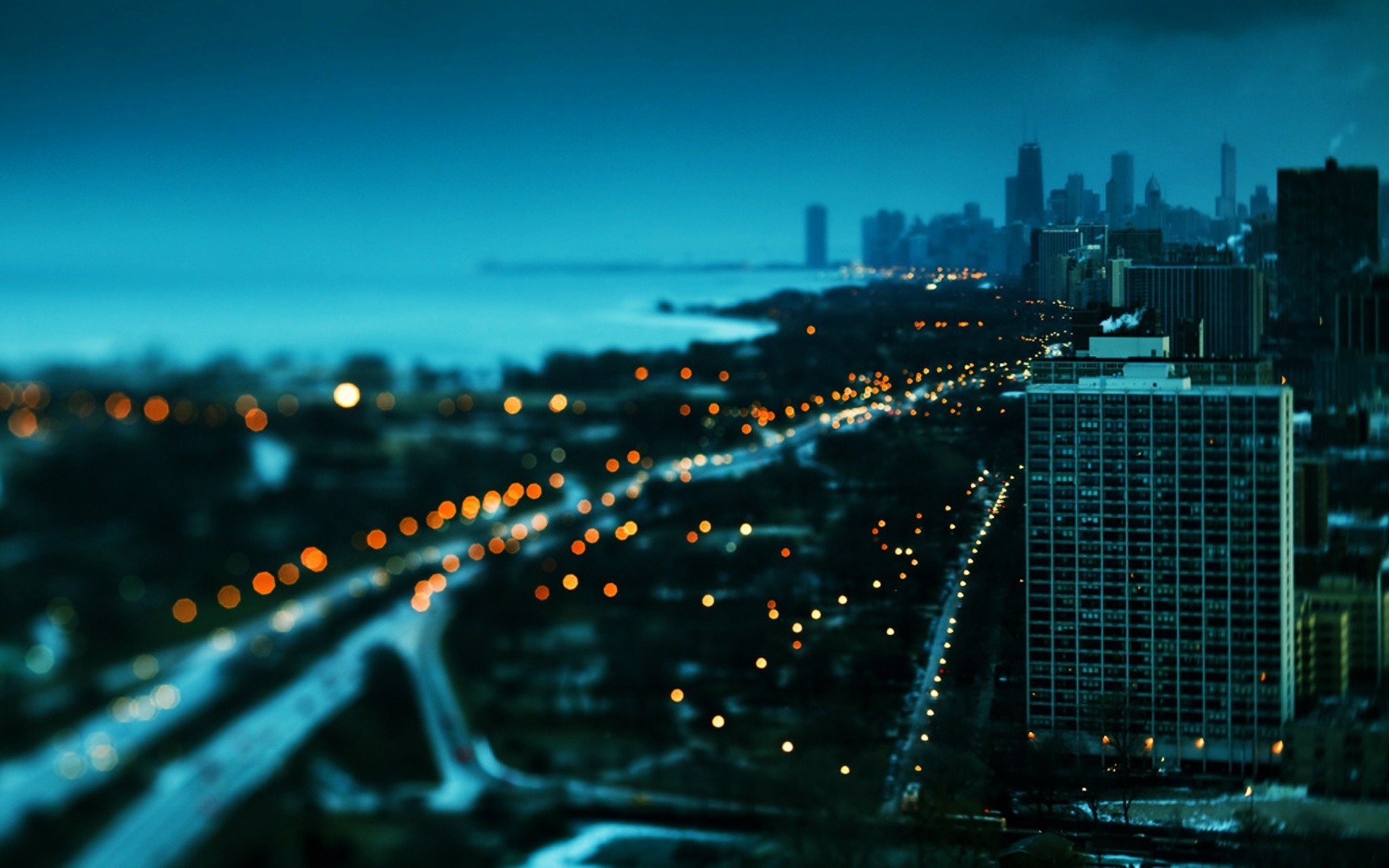 gros plan lumières hauteur ville soir