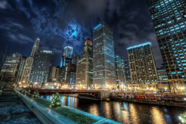 Chicago at night is reflected in the water