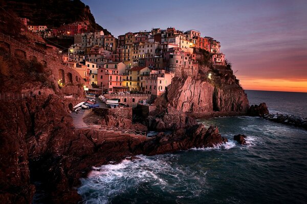 Panorama of the city near the ocean at sunset