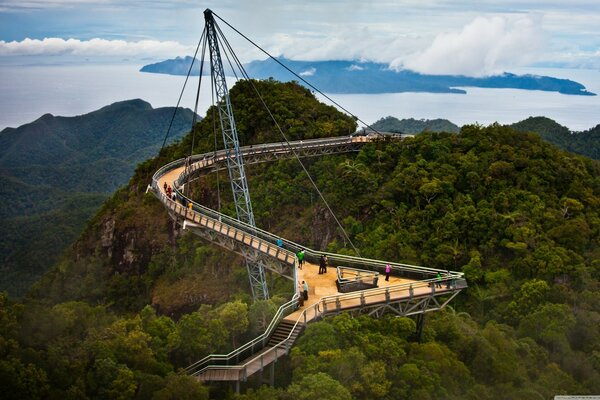 Mountains in Malaysia. Walking on the bridge