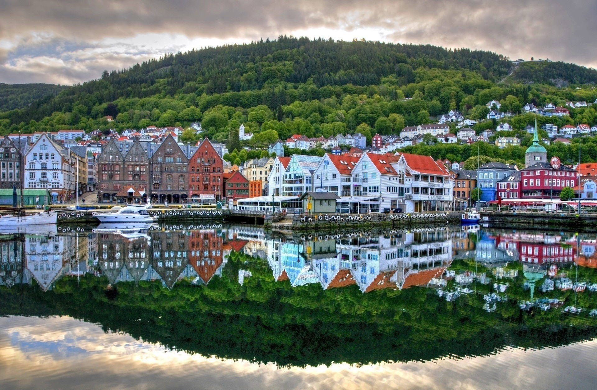 river boat reflection norway pier street house