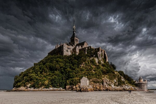 Abbey on the hill under the clouds