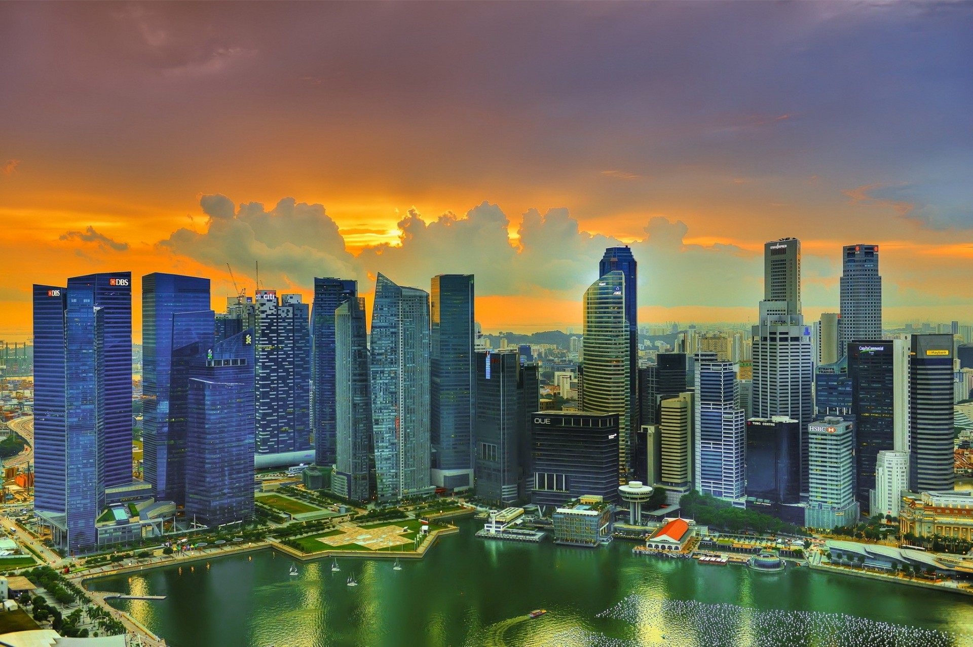 sonne wolken wolkenkratzer sonnenuntergang singapur