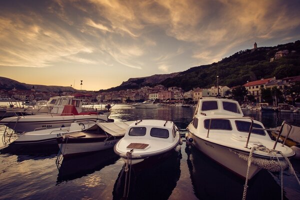 Croatia bay with boats at sunset