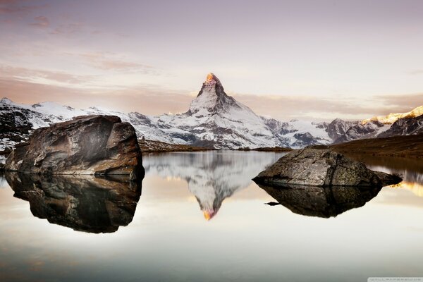 Switzerland matterhorn rocks and snow-capped mountains