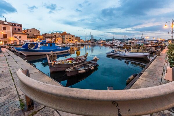 Evening boat pier in Italy