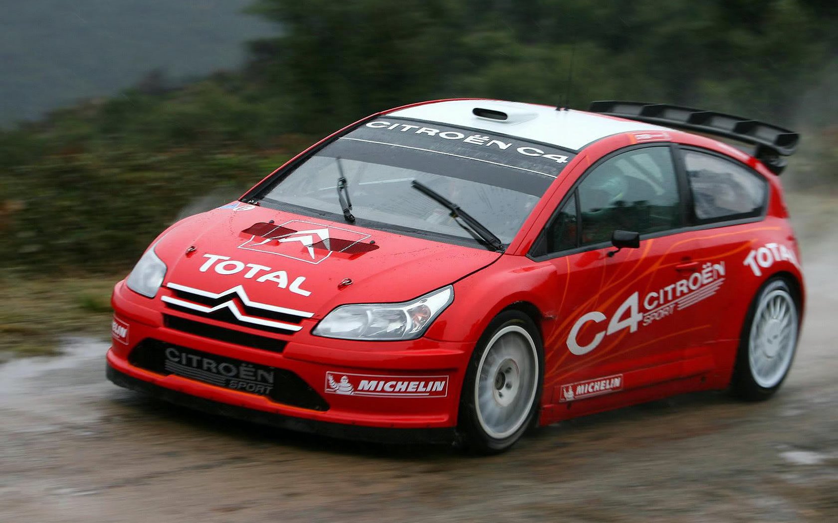 лидер сибастьян леб дождливая погода citroen c4 wrc ралли скорость движение красное авто надписи легковые авто транспорт авто автотранспорт