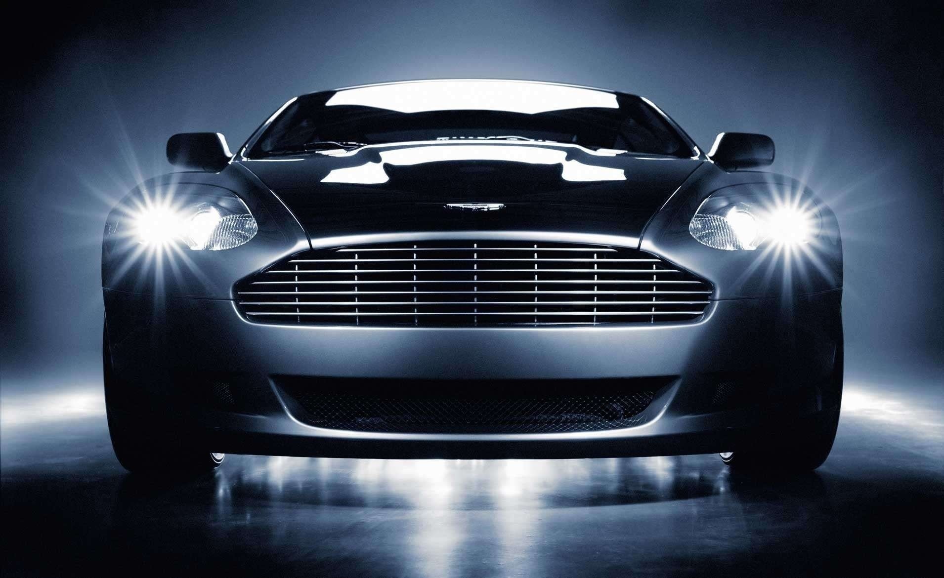 świecące reflektory aston martin optyka atrapa chłodnicy szary auto przód światło samochody samochody transport motoryzacja blask blask światła taczka