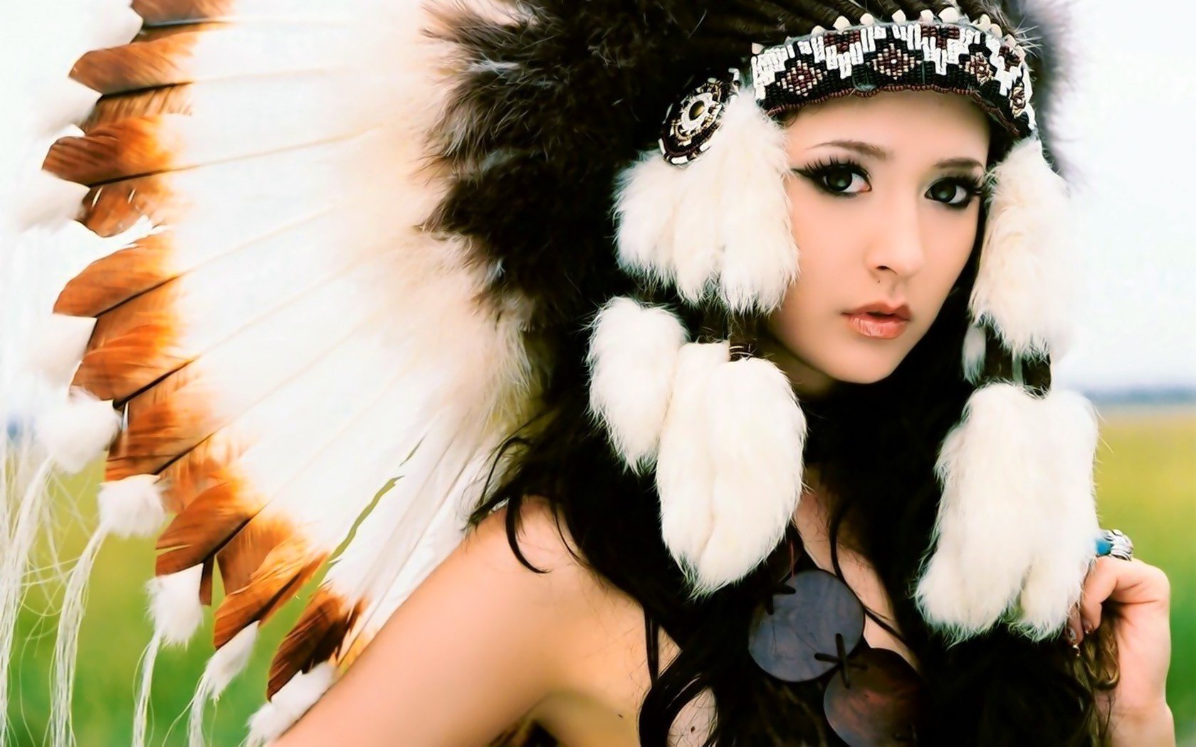 the chief of the tribe squaw feathers fur girl expressive eyes centerfolds portrait look women face eye