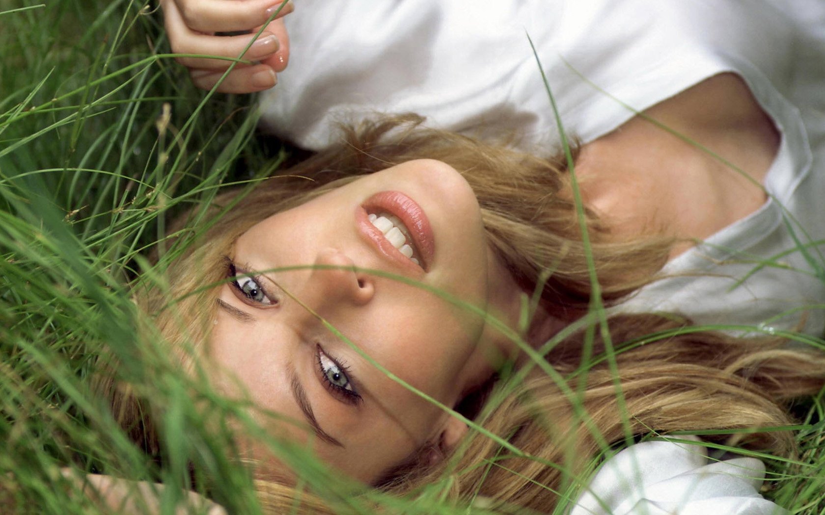 girl in the grass looking at you camping mig blondinochka face grass look eyes smile lips hair centerfolds portrait girls blonde women