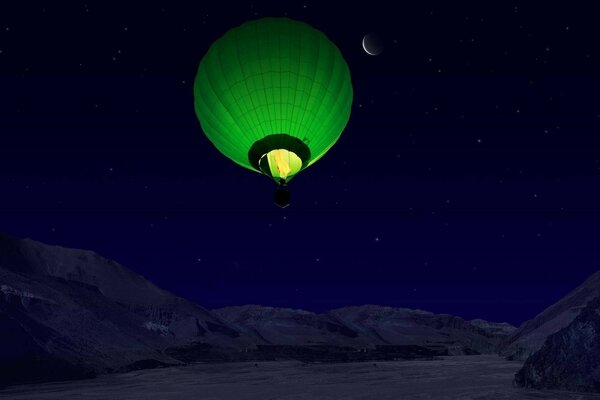 Green Balloon at night in the mountains