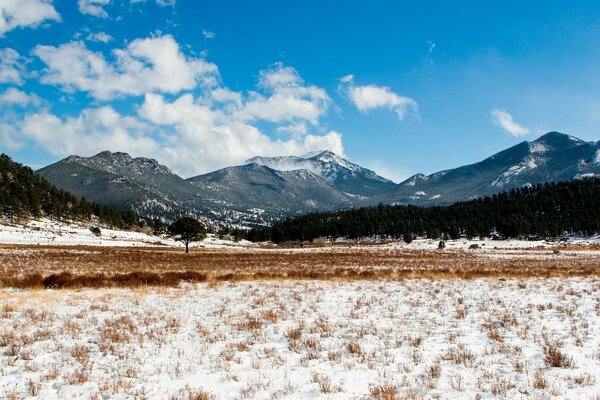 Mountains in fluffy clouds