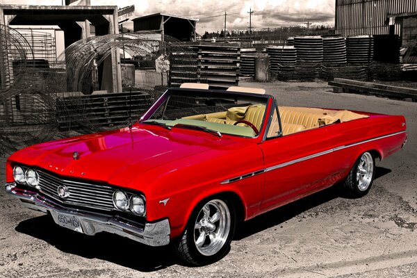 Red buick on a black and white background