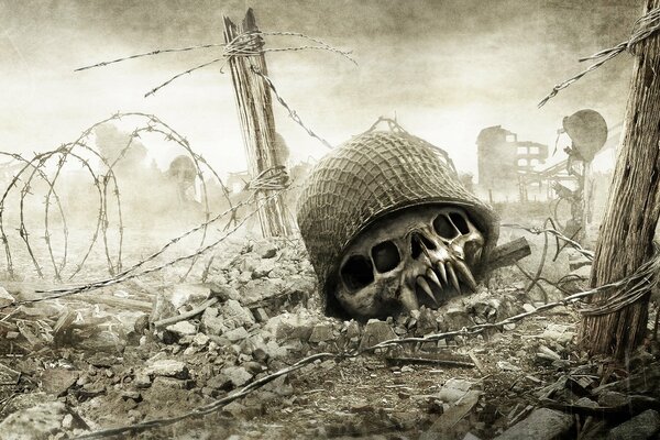 A skull in a helmet at the fence with barbed wire