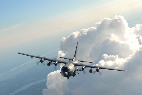 A large unmanned aircraft against a background of dense clouds