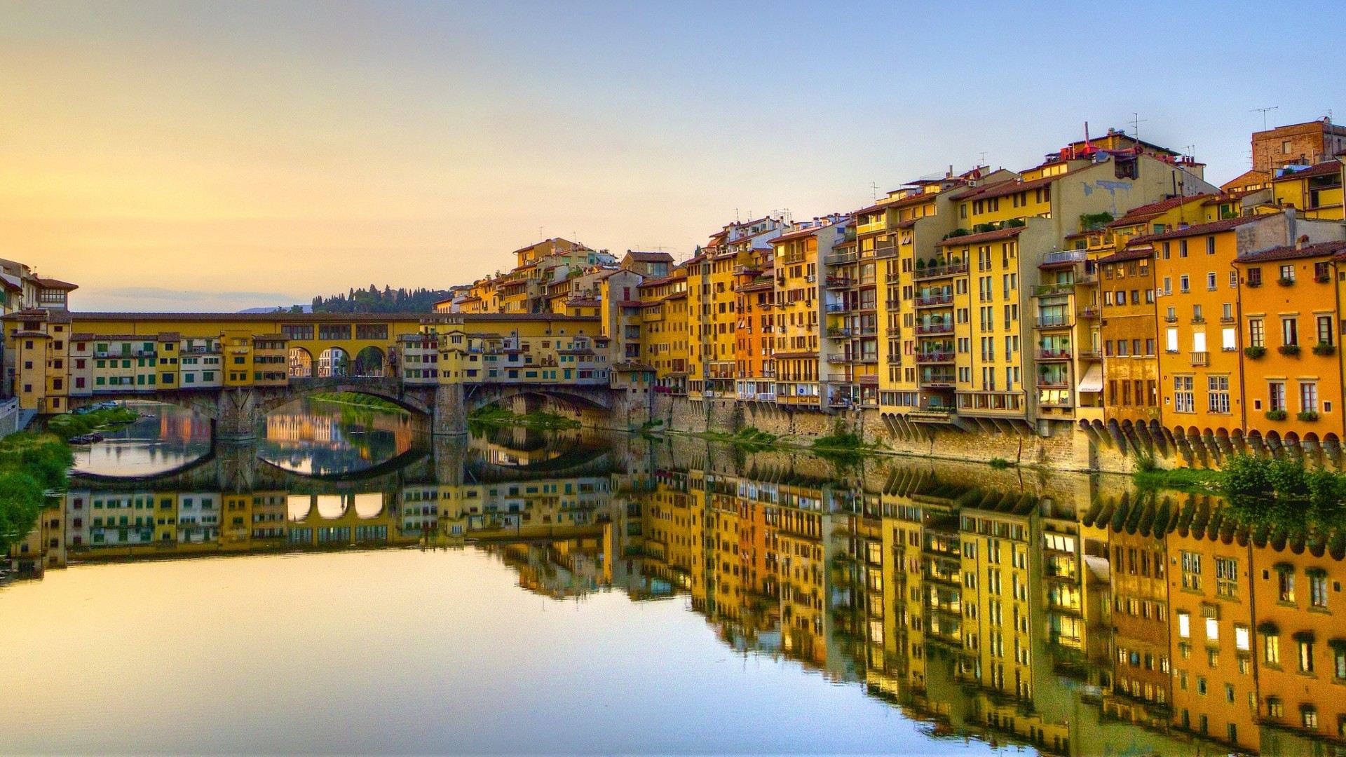 italy river reflection bridge florence building arno river vasari corridor ponte vecchio