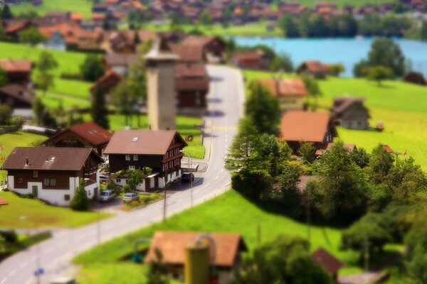 Beautiful toy houses. Village. Green meadows