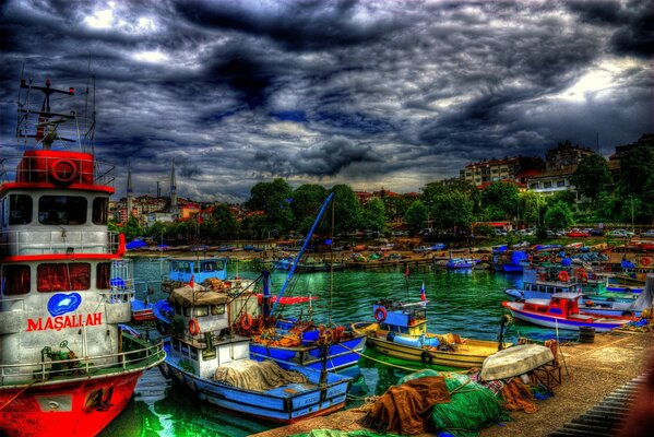 Clouds over a bay with boats in Turkey