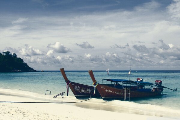 Two boats on the seashore