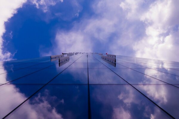 The mirror wall of a skyscraper going up