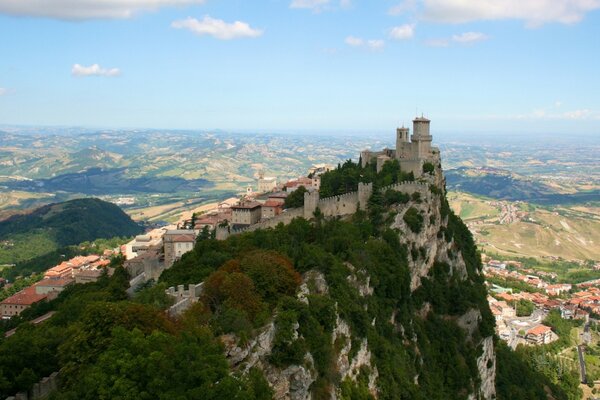 Panorama of San Marino with Monte Titano mountain on the background of houses