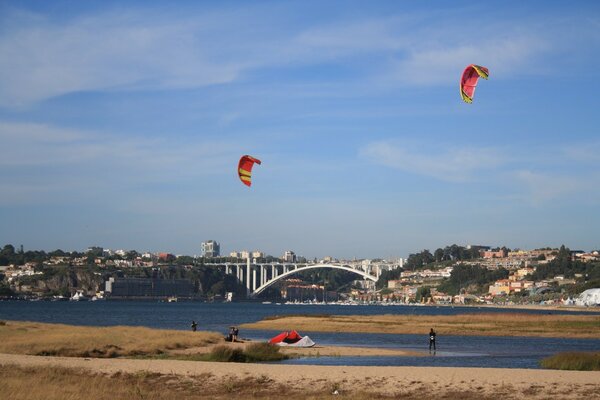 Kites over a river in Portugal