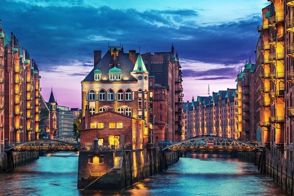 Hamburg at night against a black sky