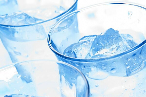 Three glasses with ice blue shade