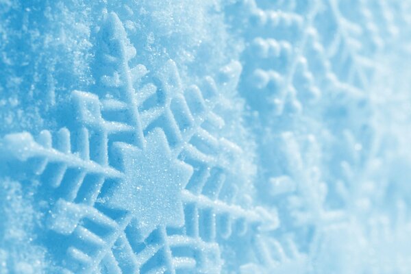 Patrón de copo de nieve sobre fondo azul