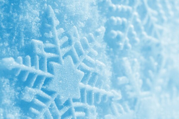 Modello di fiocco di neve su sfondo blu